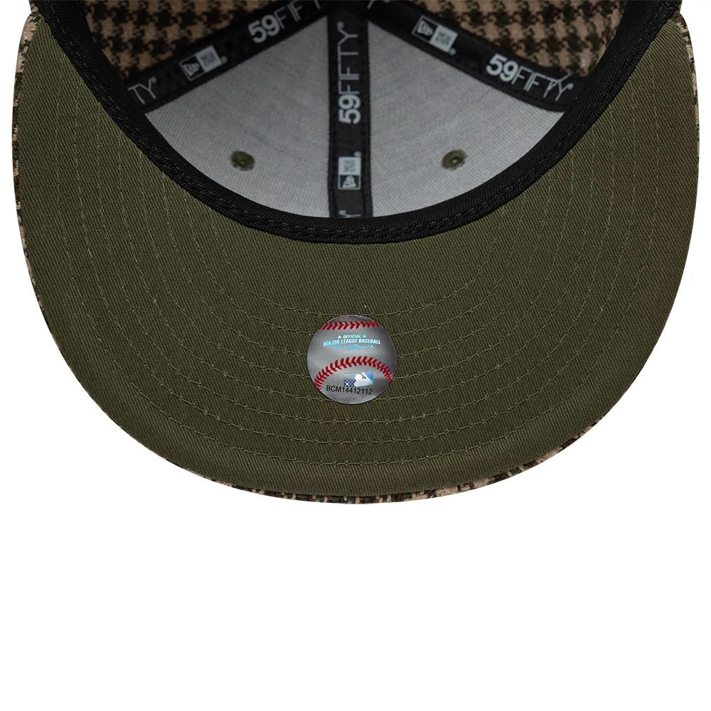 Pictured is this MLB Houndstooth New York Yankees 59FIFTY Fitted cap in dark green. 7