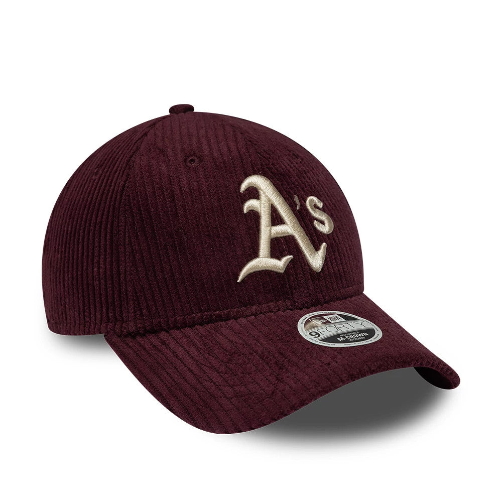 Athletics Womens MLB Chunky Cord Dark Purple New Era 9FORTY M-Crown Adjustable Cap, three-quarter view showing a raised beige embroidered A's logo on the front panel, with a rounded visor and a 9FORTY size sticker on the dark purple cord fabric.