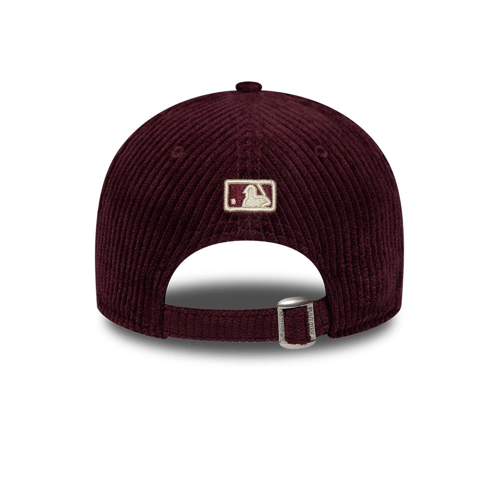 Athletics Womens MLB Chunky Cord Dark Purple New Era 9FORTY M-Crown Adjustable Cap, rear view showing the beige embroidered MLB Batterman logo at the centre back, set on a dark purple textured corduroy crown with a fabric strap and buckle.