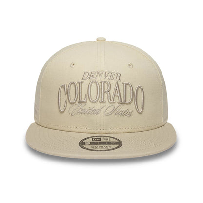Pictured is this New Era Fabric Script 9FIFTY Snapback cap in Cream & black. 2
