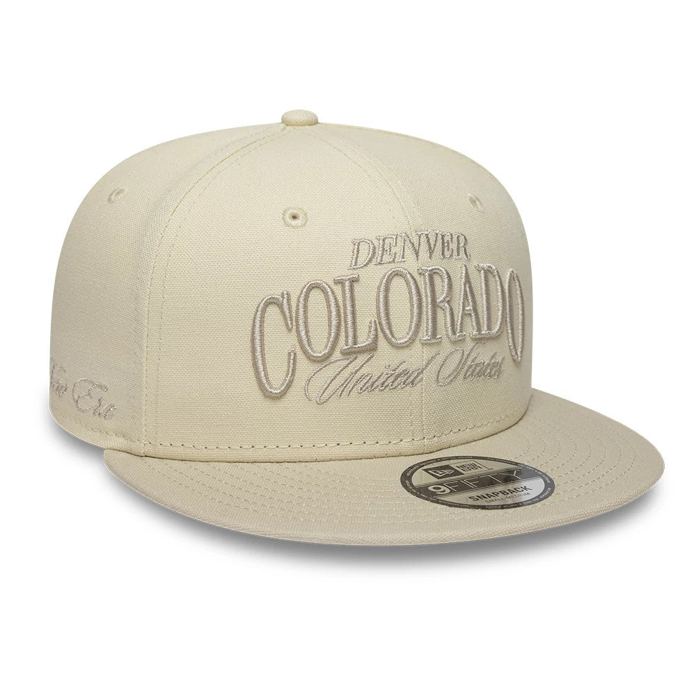 Pictured is this New Era Fabric Script 9FIFTY Snapback cap in cream. 3