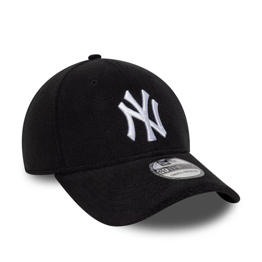 New York Yankees MLB Fleece Black New Era 39THIRTY Stretch Fit Cap, three-quarter view showing the raised white embroidered NY logo on the front panel, curved visor with 39THIRTY size sticker, and soft black fleece material.