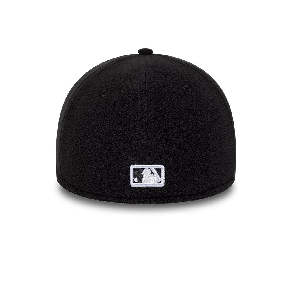 New York Yankees MLB Fleece Black New Era 39THIRTY Stretch Fit Cap, rear view showing the white MLB Batterman logo at the centre back, with black fleece fabric covering the structured crown and a curved edge along the base.