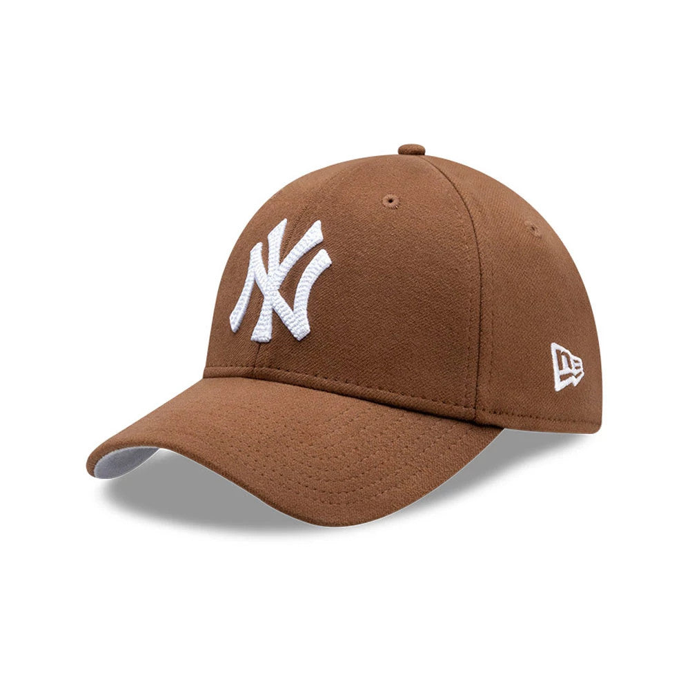 Pictured is this MLB Melton New York Yankees 39THIRTY Stretch Fit cap in brown. 3