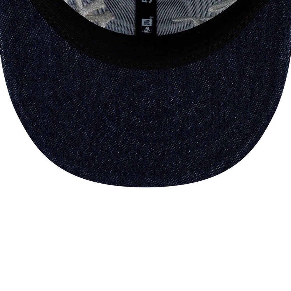New York Yankees MLB Denim Navy Low Profile New Era 59FIFTY Fitted Cap, inside view showing the structured navy denim visor, black sweatband and grey interior taping with stitching details along the undervisor.