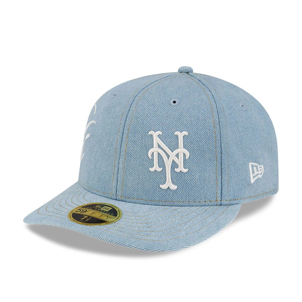 New York Mets MLB Denim Pastel Blue New Era Low Profile 59FIFTY Fitted Cap, front view showing the white raised embroidered NY logo on the front panel, light blue denim crown, and matching curved visor with a gold 59FIFTY size sticker.
