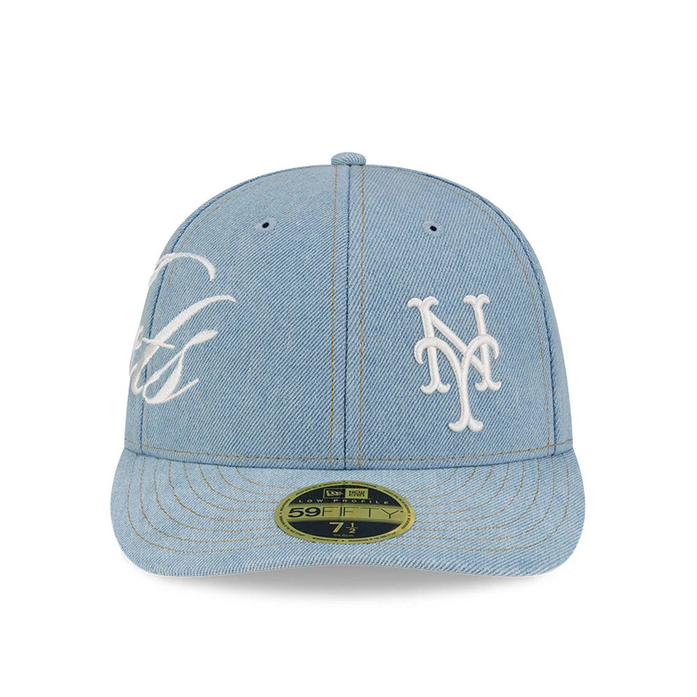 New York Mets MLB Denim Pastel Blue Low Profile New Era 59FIFTY Fitted Cap, front view showing the white embroidered Mets logo on the right front panel, script embroidery on the left, and a gold 59FIFTY size sticker on the curved visor.