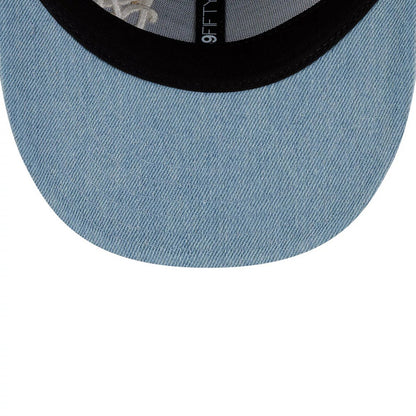 New York Mets MLB Denim Pastel Blue Low Profile New Era 59FIFTY Fitted Cap, inside view showing the black sweatband along the edge, grey taping with the 59FIFTY logo, and a denim pastel blue undervisor with a texture.