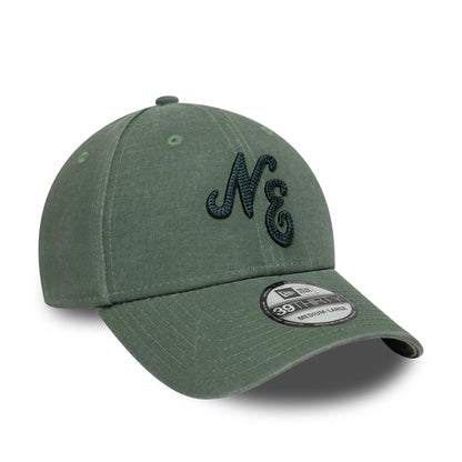 New Era Ombre Dark Green New Era 39THIRTY Stretch Fit Cap, front view showing a dark green embroidered NE script logo on the structured crown, with matching eyelets and a curved visor featuring a 39THIRTY size sticker.