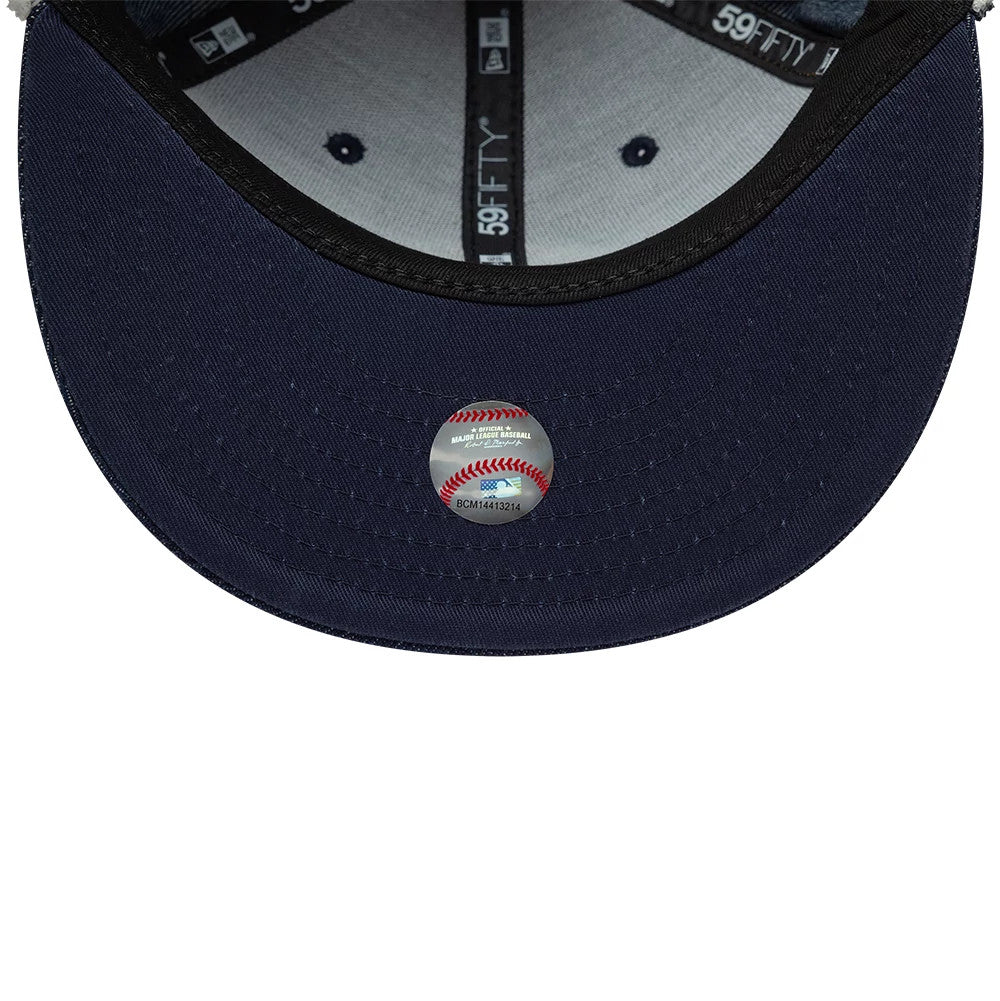 Pictured is this MLB Denim New York Yankees Dogear 59FIFTY Fitted cap in navy. 9