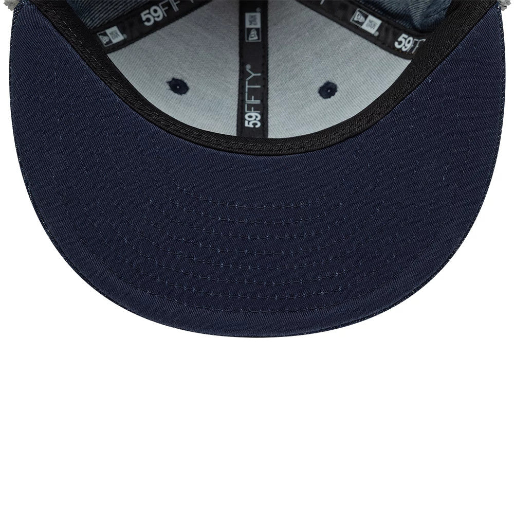 Pictured is this New Era Denim Dogear 59FIFTY Fitted cap in navy. 9