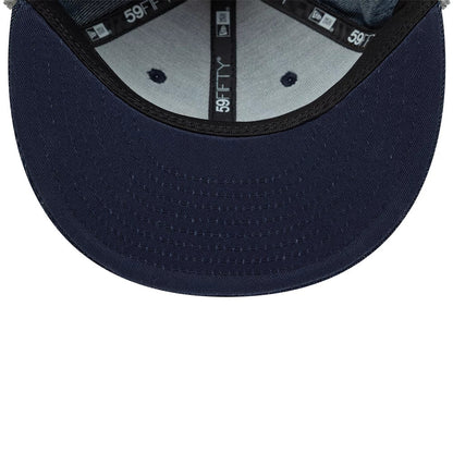 Pictured is this New Era Denim Dogear 59FIFTY Fitted cap in navy. 9