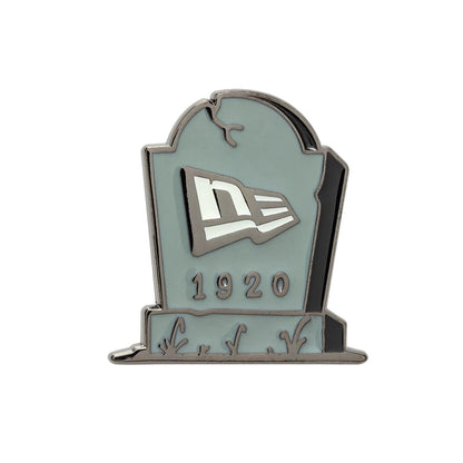 Pictured is this New Era Halloween Grave Pin Badge in grey. 1