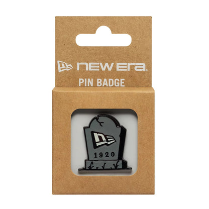 Pictured is this New Era Halloween Grave Pin Badge in grey. 3