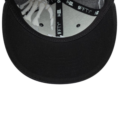 Pictured is this New Era Halloween Glow In The Dark Hands 9FIFTY Snapback cap in black. 8