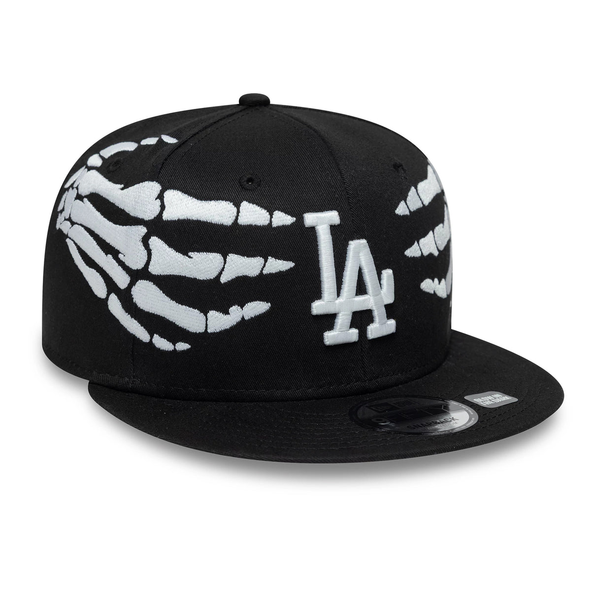 Dodgers MLB Halloween Glow In The Dark Hands Black New Era 9FIFTY Snapback Adjustable Cap, front view showing raised white LA logo embroidery on the front panel, with skeletal hand graphics on the side panels.