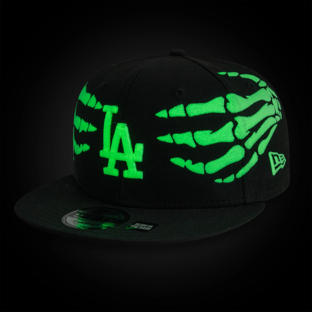 Pictured is this MLB Halloween Glow In The Dark Hands LA Dodgers 9FIFTY Snapback cap in black. 2
