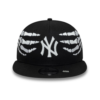 Pictured is this MLB Halloween Glow In The Dark Hands New York Yankees 9FIFTY Snapback cap in black. 3