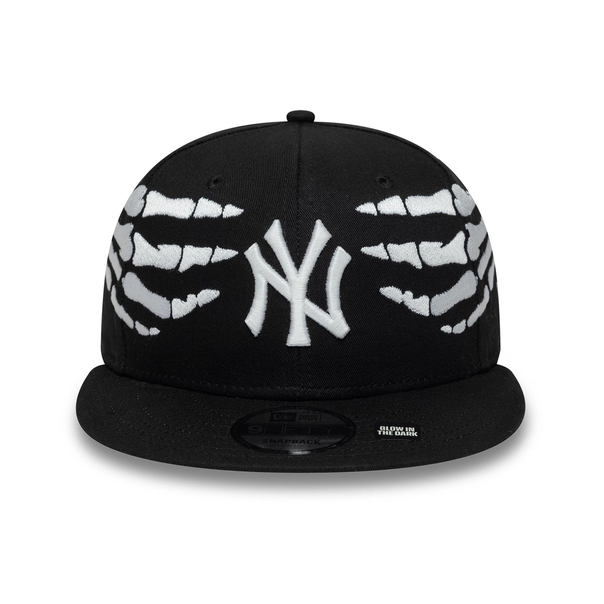 Yankees MLB Halloween Glow In The Dark Hands Black New Era 9FIFTY Snapback Adjustable Cap, front view showing white skeletal hand graphics on the side panels, a white embroidered Yankees logo on the front.