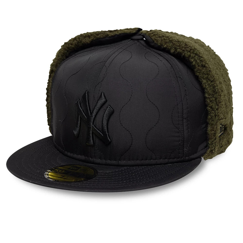 New York Yankees MLB Quilted Black Dogear New Era 59FIFTY Fitted Cap, three-quarter view showing the black raised embroidered NY logo on the front panel, quilted pattern on the crown.