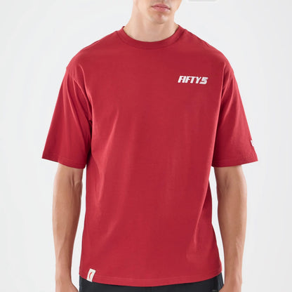 The model is wearing this Carlos Sainz Team Fifty5 Madrid Oversized T-Shirt in dark red. 3
