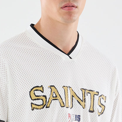 The model is wearing this NFL International Series Games 2026 Graphic New Orleans Saints Mesh Jersey in white. 3