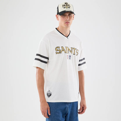 The model is wearing this NFL International Series Games 2026 Graphic New Orleans Saints Mesh Jersey in white. 1