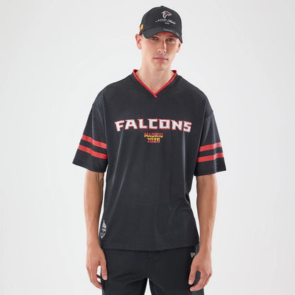 The model is wearing this NFL International Games 2026 Graphic Atlanta Falcons Mesh Jersey in black. 1