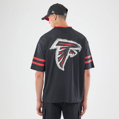 The model is wearing this NFL International Series Games 2026 Graphic Atlanta Falcons Mesh Jersey in black. 2
