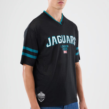 The model is wearing this NFL International Series Games 2026 Graphic Jacksonville Jaguars Mesh Jersey in black. 3