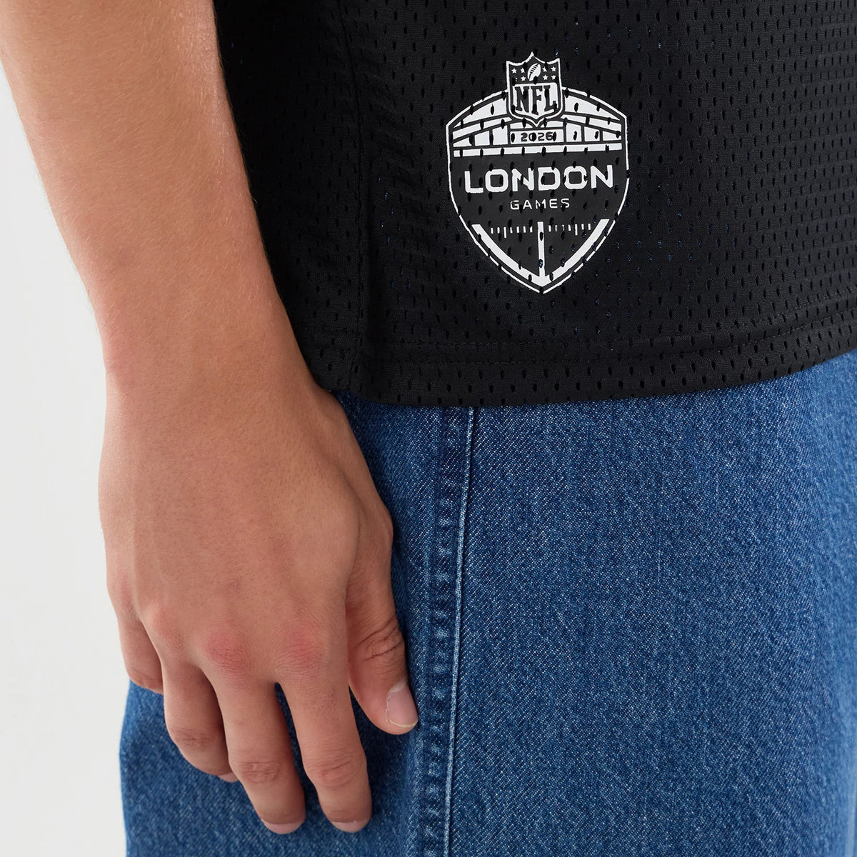 The model is wearing this NFL International Games 2026 Graphic Jacksonville Jaguars Mesh Jersey in black. 5