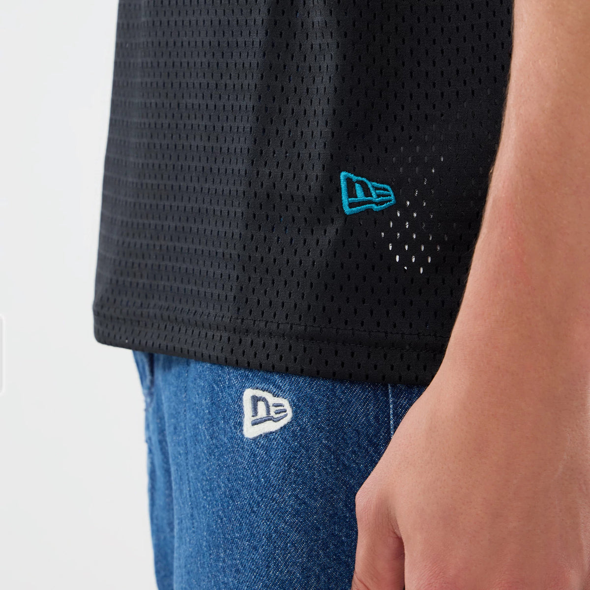 The model is wearing this NFL International Series Games 2026 Graphic Jacksonville Jaguars Mesh Jersey in black. 6