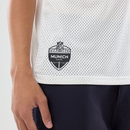 The model is wearing this NFL International Games 2026 Graphic Detroit Lions Mesh Jersey in white. 4