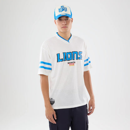The model is wearing this NFL International Games 2026 Graphic Detroit Lions Mesh Jersey in white. 1