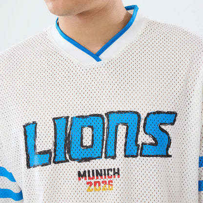 The model is wearing this NFL International Games 2026 Graphic Detroit Lions Mesh Jersey in white. 6