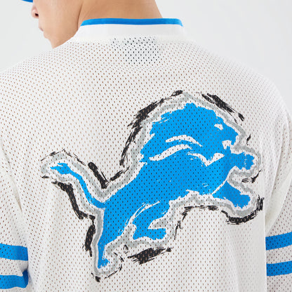 The model is wearing this NFL International Games 2026 Graphic Detroit Lions Mesh Jersey in white. 7