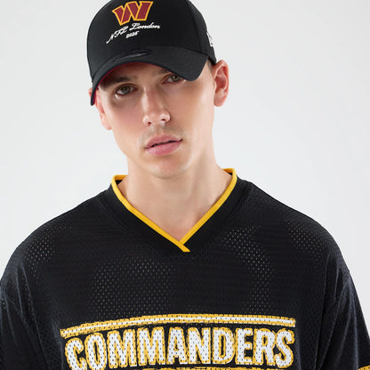 The model is wearing this NFL International Series Games 2026 Graphic Washington Commanders Mesh Jersey in black. 7