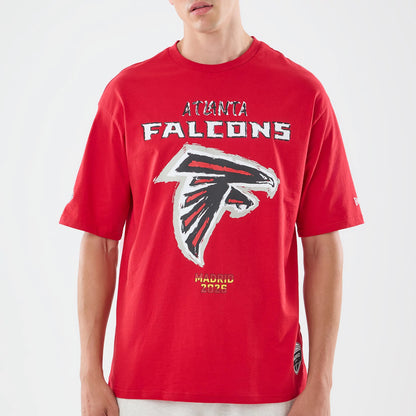 The model is wearing this NFL Graphic Slogan Atlanta Falcons Oversized T-Shirt in red. 3