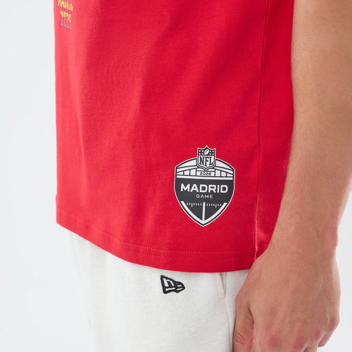 The model is wearing this NFL Graphic Slogan Atlanta Falcons Oversized T-Shirt in red. 6