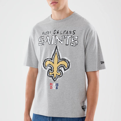 The model is wearing this NFL Graphic Slogan New Orleans Saints Oversized T-Shirt in grey. 3