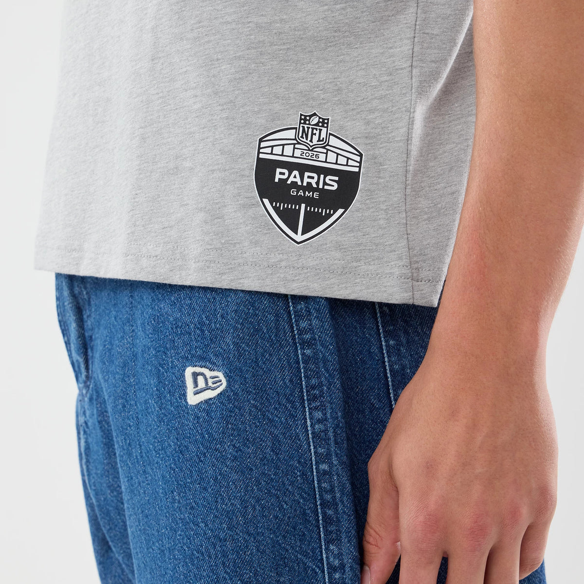The model is wearing this NFL Graphic Slogan New Orleans Saints Oversized T-Shirt in grey. 6