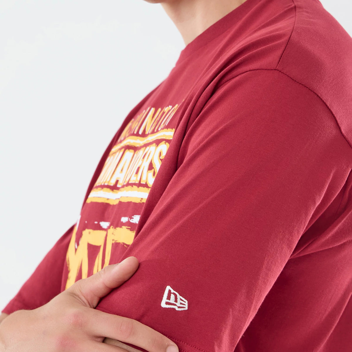 The model is wearing this NFL Graphic Slogan Washington Commanders Oversized T-Shirt in dark red. 5