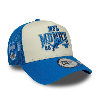 Pictured is this NFL International Series Games 2026 Munich Detroit Lions 9FORTY A-Frame Trucker cap in blue. 1