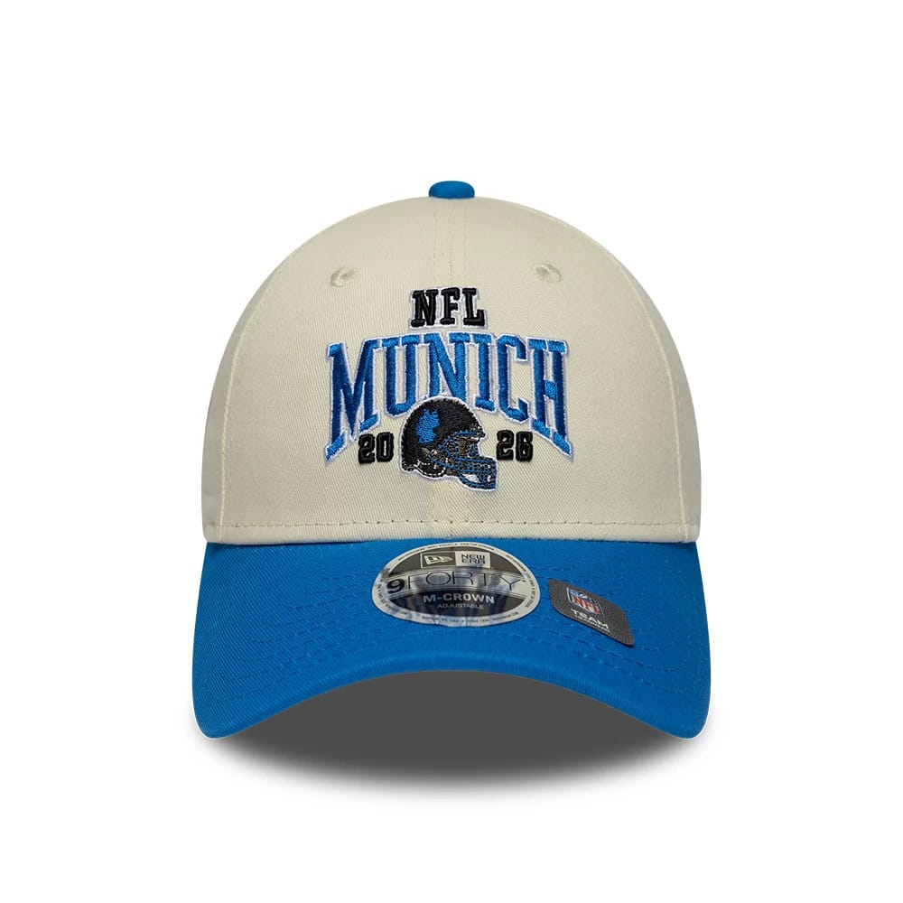 Pictured is this NFL International Series Games 2026 Munich Detroit Lions 9FORTY M-Crown cap in white & blue. 2