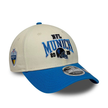 Pictured is this NFL International Series Games 2026 Munich Detroit Lions 9FORTY M-Crown cap in white & blue. 1