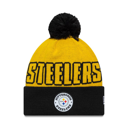 Pictured is this NFL International Series Games 2026 Paris Pittsburgh Steelers Cuff Knit Beanie hat in dark yellow. 1