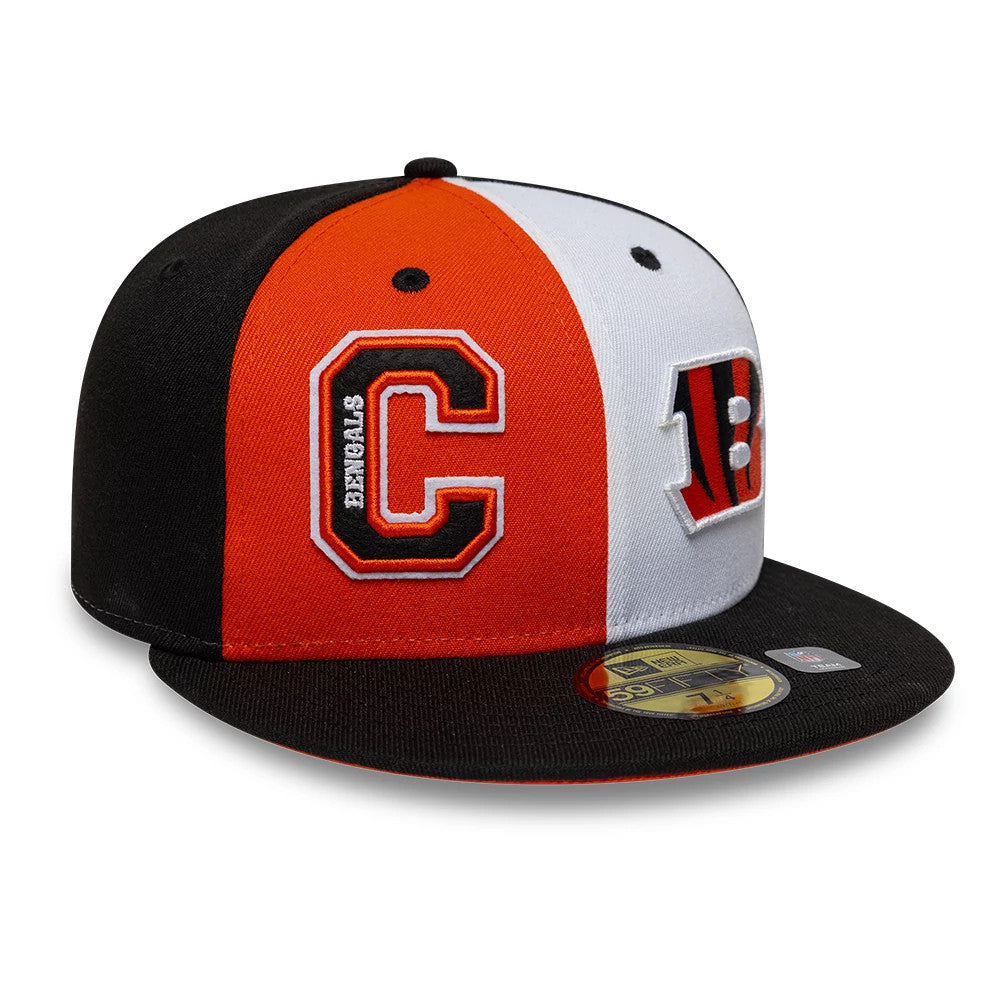 Bengals NFL International Games Black New Era 59FIFTY Fitted Cap, three-quarter view showing a front panel with a orange and black C logo, the white and orange panels on the crown, and the gold 59FIFTY size sticker on the black flat visor.