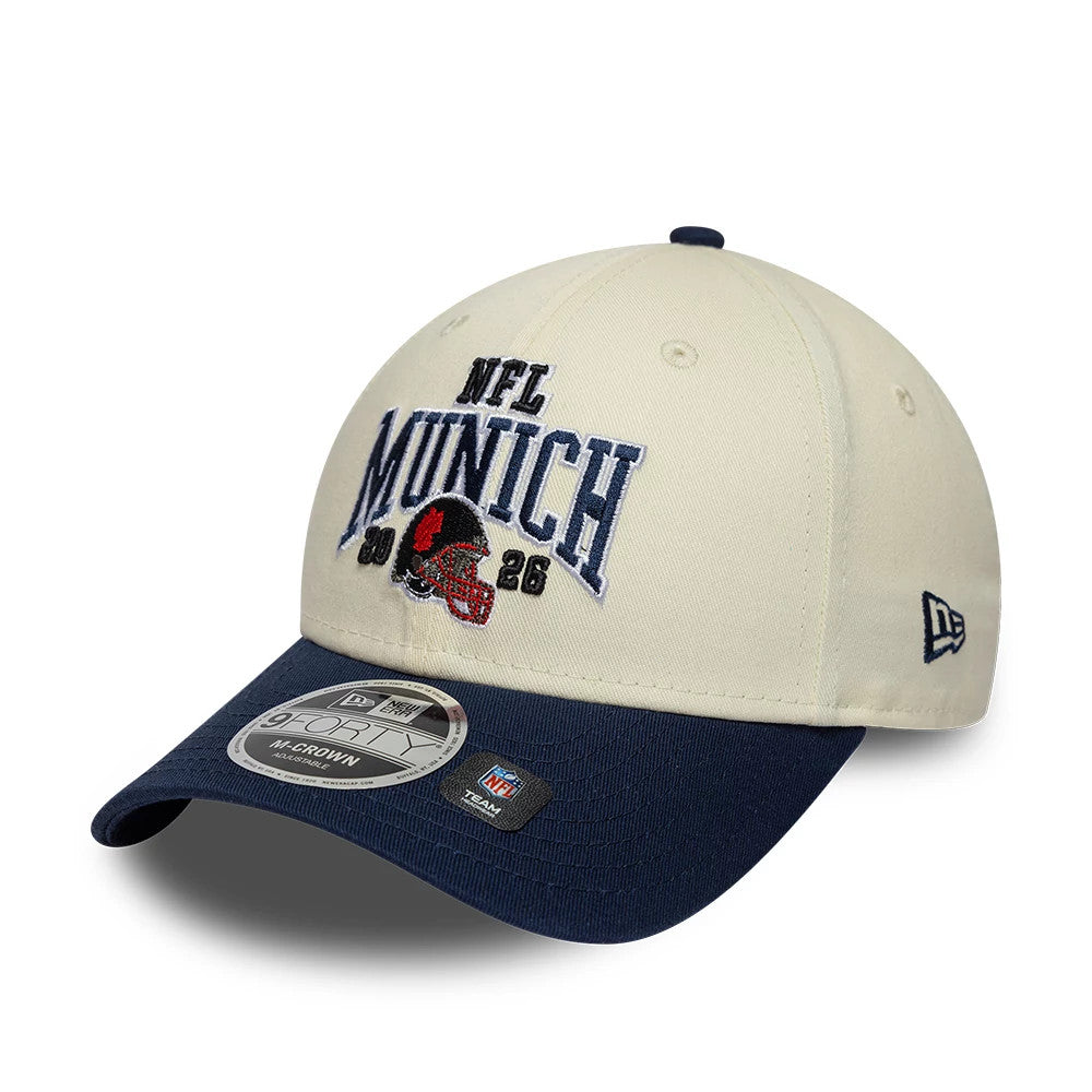 Pictured is this NFL International Series Games 2026 Munich New England Patriots 9FORTY M-Crown cap in white & dark blue. 3