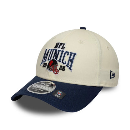 Pictured is this NFL International Series Games 2026 Munich New England Patriots 9FORTY M-Crown cap in white & dark blue. 3