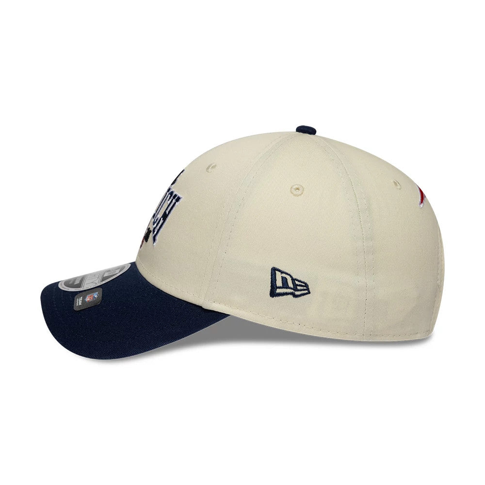 Pictured is this NFL International Series Games 2026 Munich New England Patriots 9FORTY M-Crown cap in white & dark blue. 4